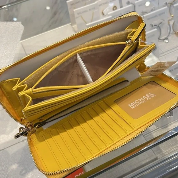 MICHAEL KORS JST 
Leather Continental Wristlet Phone Case Wallet 
Daisy Yellow - Picture 8 of 16